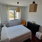 Hébergement de vacances Adosado Con Jardin *